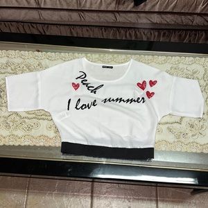 White crop top with black waistband